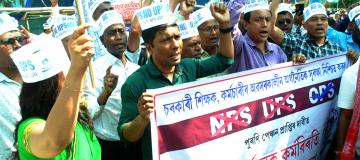 State Govt employees staging a protest  against NPS at Chachal in Guwahati on 24-03-25.Pix by UB Photos